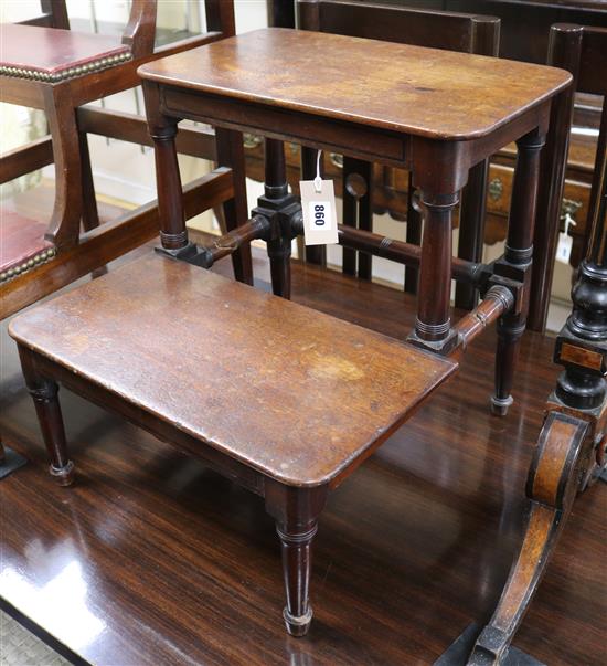 A set of George III mahogany two tread library steps, on turned and square supports and legs, united by similar stretchers, W.44cm
